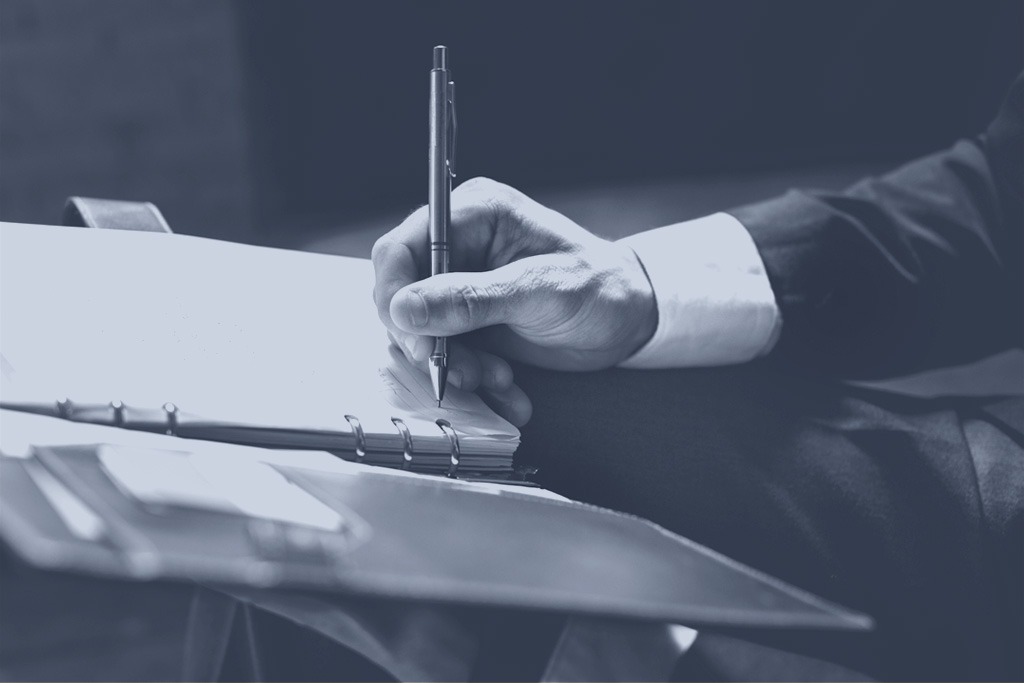 Lawyer Reviewing Car Accident Settlement Nyc