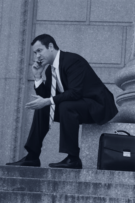 Black and white photo of Eric Richman, Esq. at a government building for the car accident attorney in Ulster County